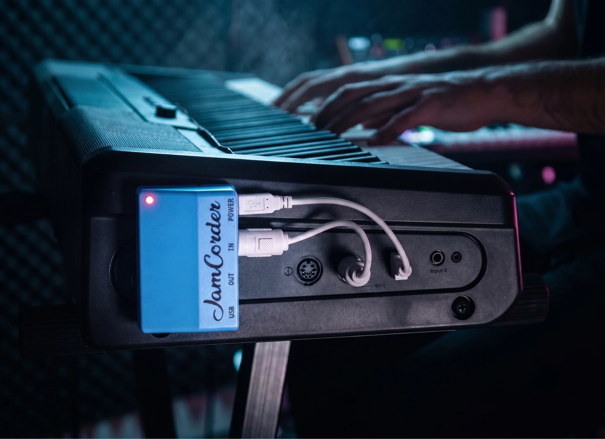 A Jamcorder connected to a piano